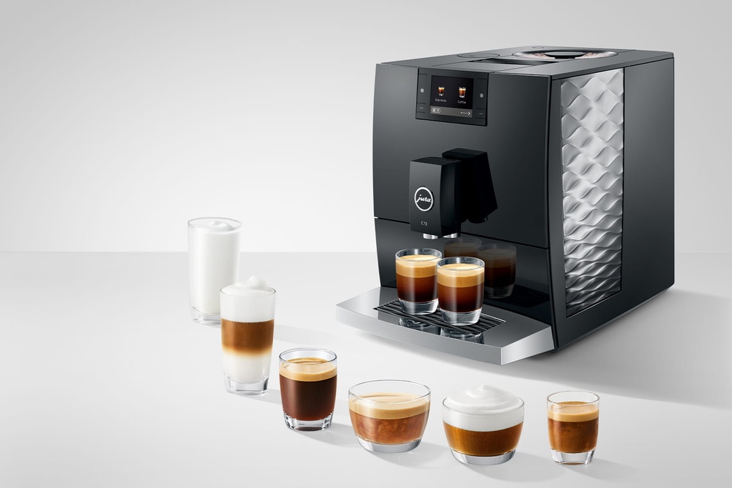 Jura C9 met verschillende koffies ervoor